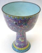 An Oriental enamelled large stemmed Goblet, painted with birds and foliage, on a predominantly lilac