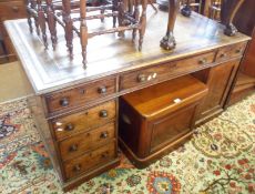 An early 19th Century Mahogany twin pedestal Partners Desk, both sides fitted with five short and