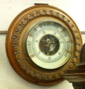 A small early 20th Century Mahogany cased Aneroid Barometer, with moulded case, 6 ½” diam