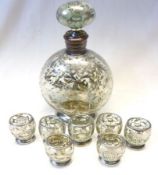 An unusual, probably French, white metal overlaid Glass Liqueur Set comprising: A Decanter of