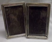 A pair of George V rectangular Silver mounted Photograph Frames of plain design, wooden easel backs,