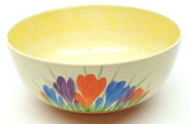 A Clarice Cliff Newport Pottery Crocus pattern Bowl, typically decorated in orange, green and purple