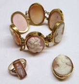 An unmarked yellow metal Bracelet of six Shell and Hardstone cameos of classical ladies together