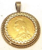 A Victorian Gold Sovereign dated 1892 within a Diamond engraved 9ct Gold Pendant with rope twist