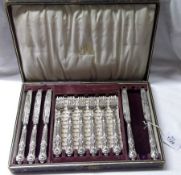 A cased set of six late Victorian plated bladed Dessert Forks, with Silver encased Kings pattern