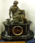 An ornate black Marble large Mantel Clock, crested with a Bronze patinated gilt metal Figure of a