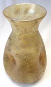 An Art Glass conical Vase of dimpled form with an everted rim, decorated with a mottled design on