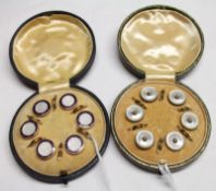 A cased set of six gilt metal, enamelled and Mother of Pearl centred Dress Buttons and a similar set