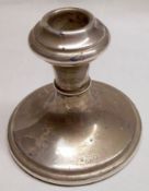 A An Elizabeth II Silver Mounted Dressing Table Candlestick in Capstan style, loaded base, 3 ½”