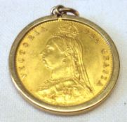 A Victorian Gold Half Sovereign dated 1887 within a hallmarked 9ct Gold Plain Pendant Mount.