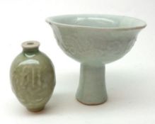 A small Celadon stemmed Drinking Goblet, moulded with rosettes and foliage and a further small