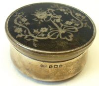 An Edwardian circular Dressing Table Box, Silver inlaid Tortoiseshell push-on lid, 2 ½” diam, (minor