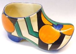A Clarice Cliff Clog, decorated with the “Picasso Flower” design, 5 ½” long.