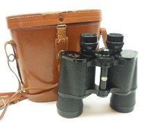 A set of Zenith 10 x 50 Field Binoculars, number 77571, in Leather Case, 7” long