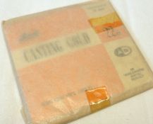 Two pacts of Ash 22K casting Gold each pack containing 10 dwt (approximately ½ oz) (2).