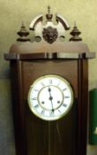 A 20th Century Mahogany Vienna style large Wall Clock, broken arched pediment with central mask