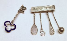 A hallmarked Silver “Bentley Priory” Bar Brooch with four Pendant drops including a tennis racket