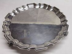 An Edward VII small Card Salver, in Georgian style, circular shaped with “pie crust” edge and