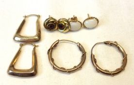 Four various pairs of yellow metal Earrings.