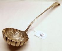 A George III base marked Soup Ladle, Old English pattern with scalloped circular bowl, crested,