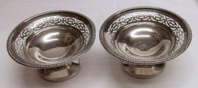 A pair of George V pedestal Bon-Bon Dishes, circular shaped with pierced and gadrooned rims,