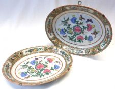 A set of two graduated Canton Dishes of oval form, decorated in famille verte and rose with