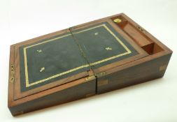 A small late Victorian Walnut veneered Writing Box, the centre fitted with sloped lined interior, to
