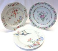 Three 18th Century Oriental Plates, one of octagonal form, painted predominately in famille rose and