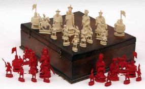 An early 20th Century Ivory and red stained Chess Set, all modelled as hierarchical Oriental figures