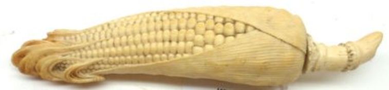 An Oriental Ivory Model of a Maize Bud with detachable handle, 7” long.