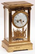 A French gilt metal four glass large Mantel Clock, Raingo Freres Paris, the corners applied with