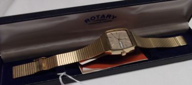 A Gents 1970’s cased Rotary Gold plated Wristwatch, Gold batons to a brown metallic shaped square