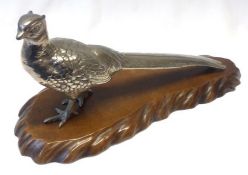 A finely cast Japanese Silver-plated Model of a Cock Pheasant on original wooden stand, 11 ½” long.