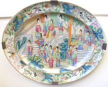 A 19th Century Canton Famille Rose oval Platter, the centre typically decorated in traditional