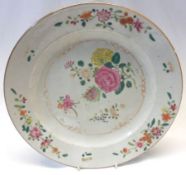 An 18th Century Chinese circular Plate, painted in famille rose and verte with sprigs and sprays