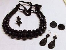 A graduated Jet type facetted bead Necklace, pair of Earrings, Brooch and two pair of Earrings and