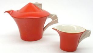 A Wilkinsons Limited art deco style Tea Pot and Cream Jug, decorated in orange with cream handles,