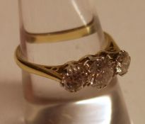 A high grade precious metal three old cut Diamond Ring of approx.85ct total, stamped “18ct”.