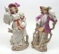 A pair of European Lustre Figures depicting a young dandy and his female companion, each with