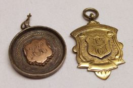 Two various presentation inscribed Chain Fobs, one shield-shaped Silver Gilt example, the other