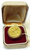 A George V Gold Half Sovereign dated 1913 mounted in a 9ct Gold Ring with fluted side, total