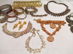 A large pack of assorted Costume Jewellery including Bangles, Necklaces, gilt Necklaces, gilt