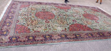 A fine Iranian mid-20th Century large Carpet, with multi-gull border and well decorated throughout