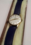 A Gents mid 20th Century 9ct Gold Cased Tudor Royal Wristwatch, Gold batons to a silvered dial, Gold