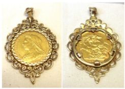 A Victorian Gold Sovereign dated 1894 within a decorative hallmarked 9ct Gold rolled edge surround