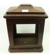 A Mahogany Bracket Clock Case, the overhanging cornice with moulded surround and facetted pediment