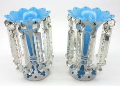 A pair of decorative French overlaid Glass Lustres, with foliate rims, hung below with clear glass