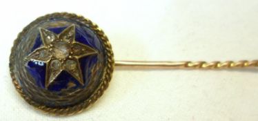 A Victorian Gold Stickpin, the large circular finial with a star of small rose cut Diamonds to the