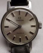 A Ladies Stainless Steel cased Omega mechanical Wristwatch, batons to a Silvered dial, ¾” diam,