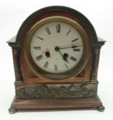A formerly Silver-plated Mantel Clock of arched form, Vincentt & Co and strike on bell movement,